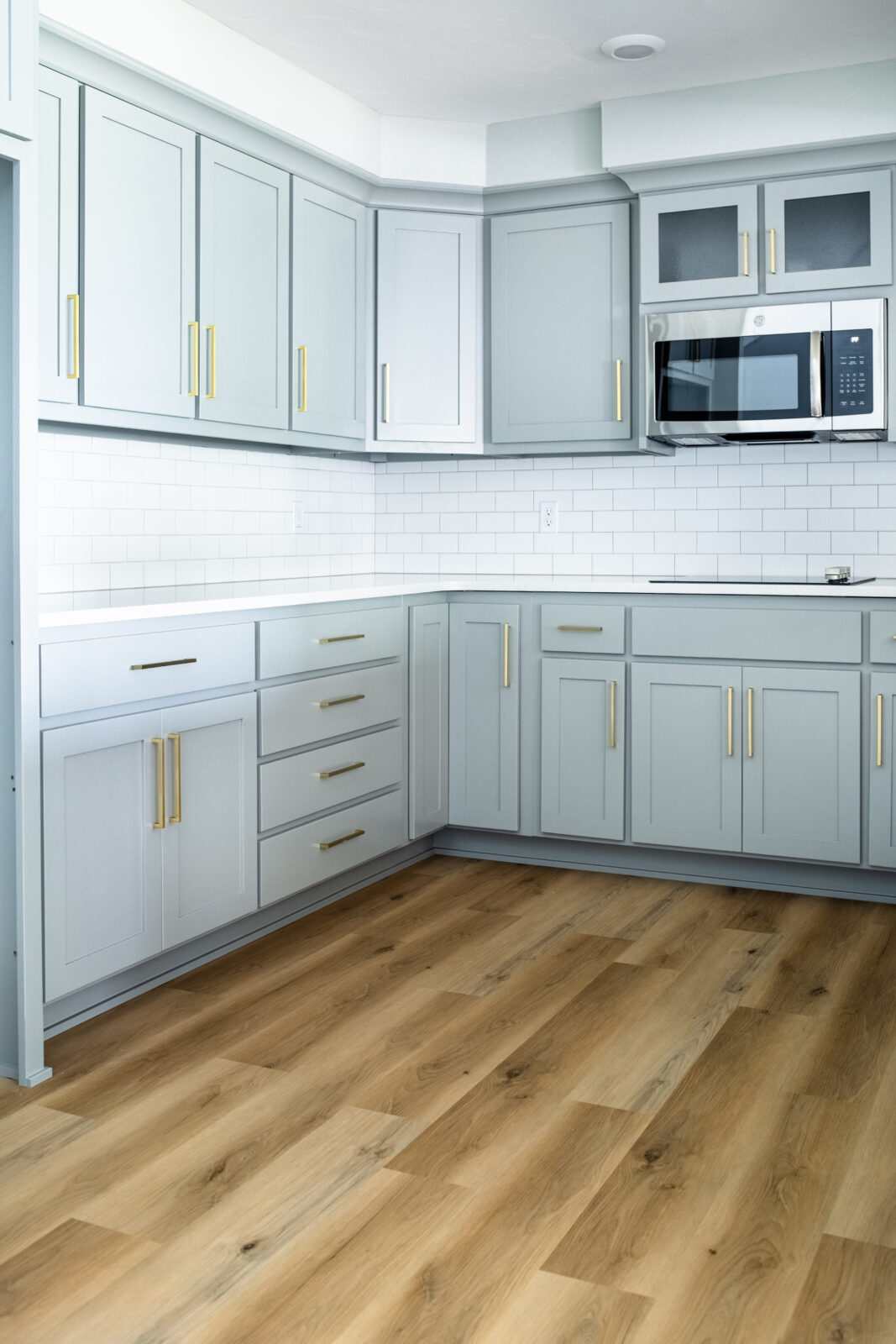 Hardwood floors and white cabinets | America's Flooring Store