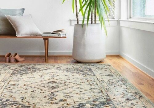 Area rug on hardwood floor | America's Flooring Store