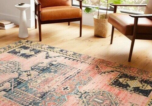 Area rug on hardwood floor | America's Flooring Store